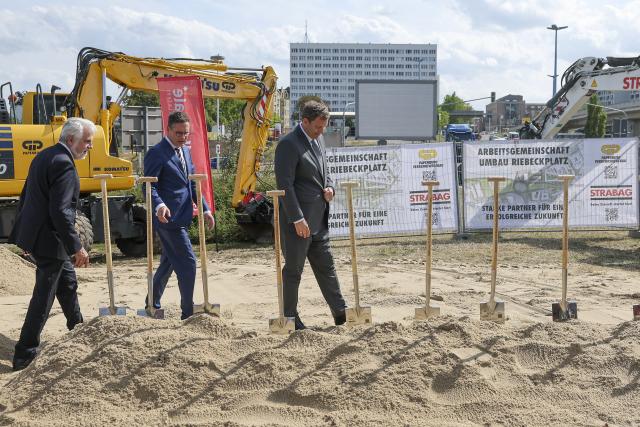 20 August 2026, Saxony-Anhalt, Halle (Saale): (R-L) German Finance Minister Lars Klingbeil, Mayor of Halle Alexander Vogt and Minister for Science, Energy, Climate Protection, and the Environment of Saxony-Anhalt Armin Willingmann participate in the groundbreaking ceremony for the renovation of Riebeckplatz to house the planned "Center for German Unity and European Transformation". Photo: Jan Woitas/dpa