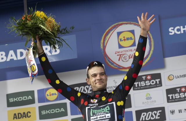 20 August 2026, Hesse, Schwaebisch Hall: German cyclist Miguel Heidemann celebrates at the awards ceremony after the stage one of the 2026 Tour of Germany cycling race, 216.30 km from Bad Orb to Schwaebisch Hall. Photo: Marijan Murat/dpa
