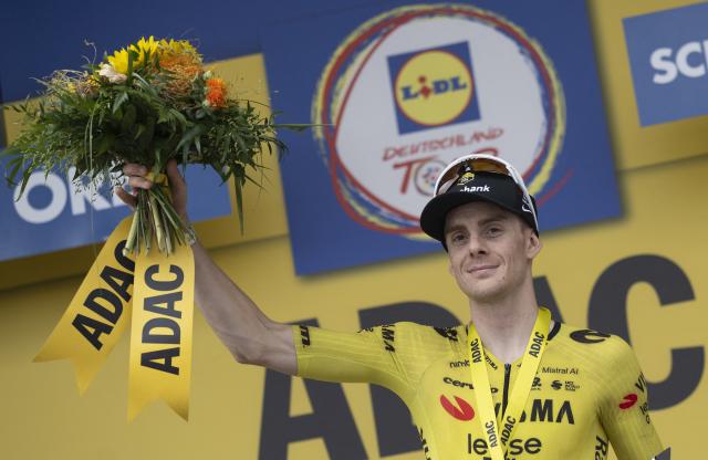 20 August 2026, Hesse, Schwaebisch Hall: French cyclist Louis Barre celebrates at the awards ceremony after the stage one of the 2026 Tour of Germany cycling race, 216.30 km from Bad Orb to Schwaebisch Hall. Photo: Marijan Murat/dpa
