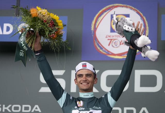20 August 2026, Hesse, Schwaebisch Hall: Mexican cyclist Isaac Del Toro celebrates at the awards ceremony after the stage one of the 2026 Tour of Germany cycling race, 216.30 km from Bad Orb to Schwaebisch Hall. Photo: Marijan Murat/dpa