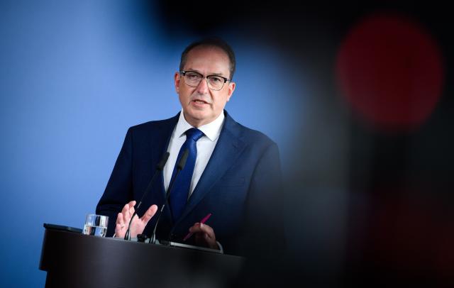 21 August 2026, Berlin: Alexander Dobrindt, German Minister of the Interior, speaks during a press conference about the investigation following the discovery of weapons. Last year, German security authorities discovered a cache containing two handguns near Berlin. Photo: Bernd von Jutrczenka/dpa