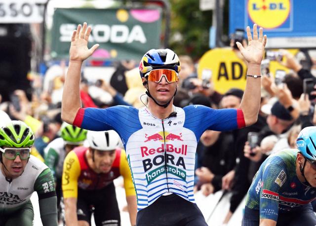 21 August 2026, Rhineland-Palatinate, Offenbach an der Queich: Italian cyclist Alessio Magagnotti of team Red Bull-Bora Hansgrohe celebrates winning the second stage of the Tour of Germany cycling race, 196.80 Km from Schwaebisch Hall to Offenbach an der Queich. Photo: Uli Deck/dpa