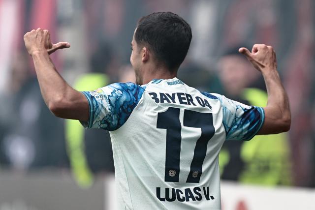 22 August 2026, Hesse, Wiesbaden: Leverkusen's Lucas
Vazquez celebrates scoring his side's second goal during the German DFB Cup first round soccer match between SV Wehen Wiesbaden and Bayer Leverkusen at BRITA-Arena. Photo: Uwe Anspach/dpa - IMPORTANT NOTICE: In accordance with the regulations of the Bundesliga and the German Football Association (DFB), it is prohibited to use or allow the use of photographs taken in the stadium and/or during the game in the form of sequential images and/or video-like photo sequences.