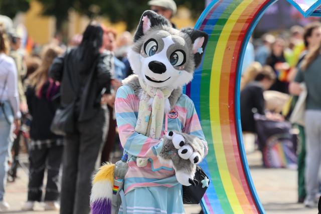 22 August 2026, Saxony-Anhalt, Magdeburg: People take part in the 30th Christopher Street Day (CSD). Under the slogan "Choose Love," about 3,000 people marched in support of diversity and openness to the world. Photo: Peter Gercke/dpa