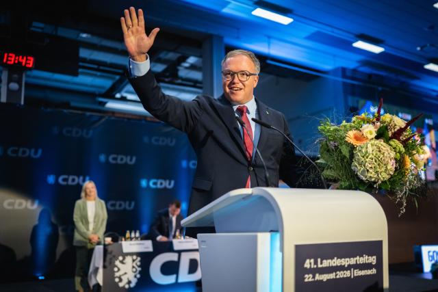 22 August 2026, Thuringia, Eisenach: Mario Voigt, Minister President of Thuringia, speaks with media representatives following his reelection as state chairman of the Christian Democratic Union (CDU) Thuringia. The CDU Thuringia convened for its 41st state party convention at the Werner-Aßmann-Halle. Photo: Jacob Schröter/dpa