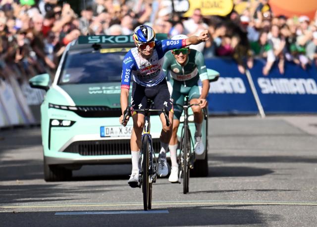 22 August 2026, Bad Duerkheim: Italian cyclist Giulio Pellizzari of team Red Bull-Bora-Hansgrohe celebrates winning the third stage of the Tour of Germany cycling race, 169.70 km from Herxheim to Bad Duerkheim. Photo: Uli Deck/dpa