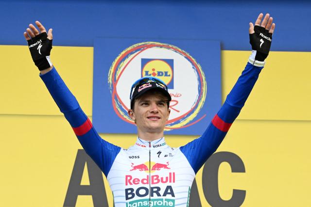 22 August 2026, Bad Duerkheim: Italian cyclist Giulio Pellizzari of team Red Bull-Bora-Hansgrohe celebrates on the podium after winning the third stage of the Tour of Germany cycling race, 169.70 km from Herxheim to Bad Duerkheim. Photo: Uli Deck/dpa