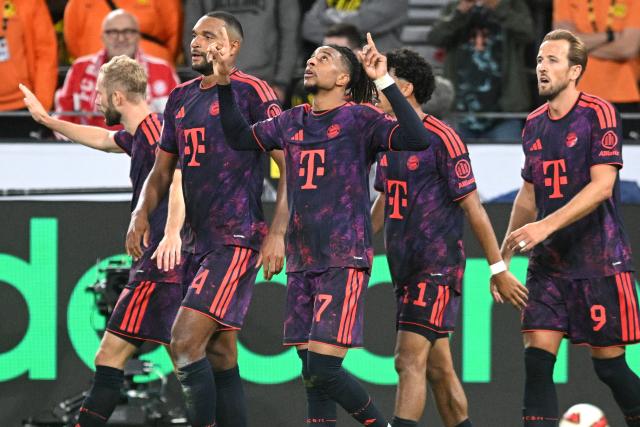 22 August 2026, Dortmund: Bayern Munich's Michael Olise celebrates scoring his side's second goal with teammates during the German Franz Beckenbauer Supercup soccer match between Borussia Dortmund and FC Bayern Munich at the Signal Iduna Park. Photo: Bernd Thissen/dpa - IMPORTANT NOTICE: Bundesliga and DFB regulations prohibit any use of photographs as image sequences and/or quasi-video.
