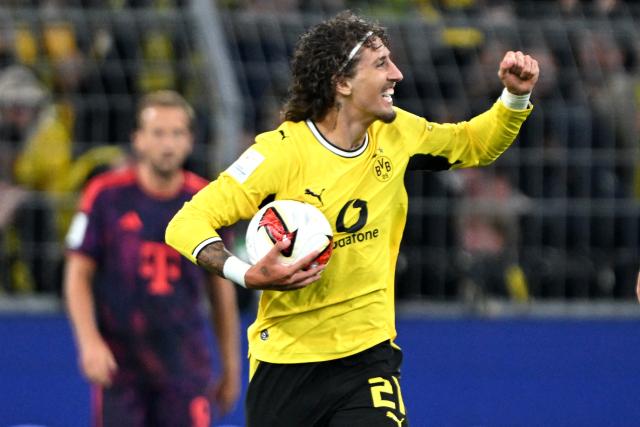 22 August 2026, Dortmund: Borussia Dortmund's Fabio Silva  celebrates scoring his side's first goal during the German Franz Beckenbauer Supercup soccer match between Borussia Dortmund and FC Bayern Munich at the Signal Iduna Park. Photo: Federico Gambarini/dpa - IMPORTANT NOTICE: Bundesliga and DFB regulations prohibit any use of photographs as image sequences and/or quasi-video.
