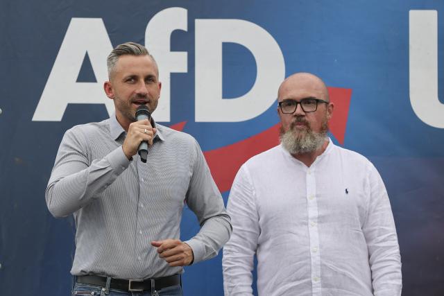 21 August 2026, Saxony-Anhalt, Querfurt: Ulrich Siegmund (L), the AfD's top candidate for the state election in Saxony-Anhalt, and Hans-Thomas Tillschneider, the party's candidate for the state election, stand together on stage at the party's family festival. Photo: Jan Woitas/dpa
