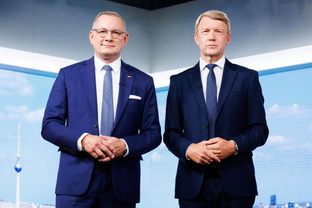 23 August 2026, Berlin: Tino Chrupalla (L), federal chairman of the AfD, and Markus Preiss (R), editor-in-chief of the ARD Berlin studio, stand in the ARD Berlin studio before the recording of the ARD summer interview on "Bericht aus Berlin" begins. Photo: Carsten Koall/dpa
