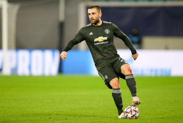FILED - 08 December 2020, Saxony, Leipzig: FILE PHOTO - Manchester's Luke Shaw in action during the UEFA Champions League group H soccer match between RB Leipzig and Manchester United at the Red Bull Arena. Photo: Jan Woitas/dpa-Zentralbild/dpa