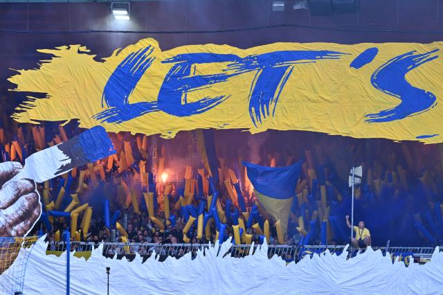 23 August 2026, Lower Saxony, Braunschweig: Eintracht Braunschweig fans display a large choreographed display with flags and banners in the stands during the German DFB Cup first round soccer match between Eintracht Braunschweig and 1. FC Union Berlin at Eintracht Stadium. Photo: Swen Pförtner/dpa