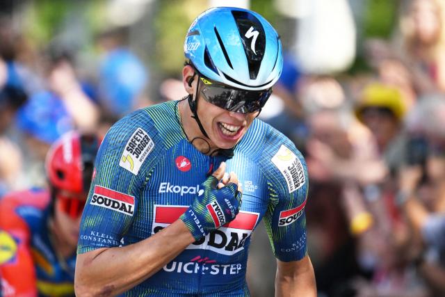 23 August 2026, Heilbronn: French rider Paul Magnier of Team Soudal Quick-Step celebrates his victory after the fourth stage of the Tour of Germany cycling race, 156.5 km from Heilbronn to Heilbronn. Photo: Uli Deck/dpa