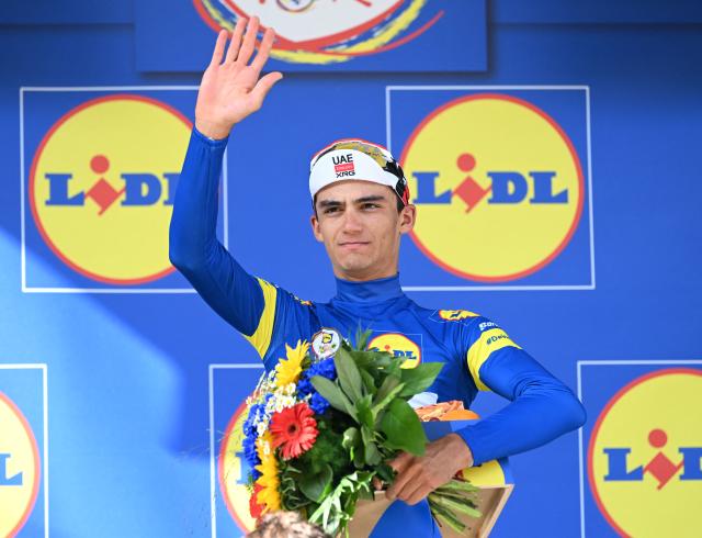 23 August 2026, Heilbronn: Mexican rider Isaac del Toro of UAE Team Emirates XRG, celebrates his overall victory after the fourth stage of the Tour of Germany cycling race, 156.5 km from Heilbronn to Heilbronn. Photo: Uli Deck/dpa