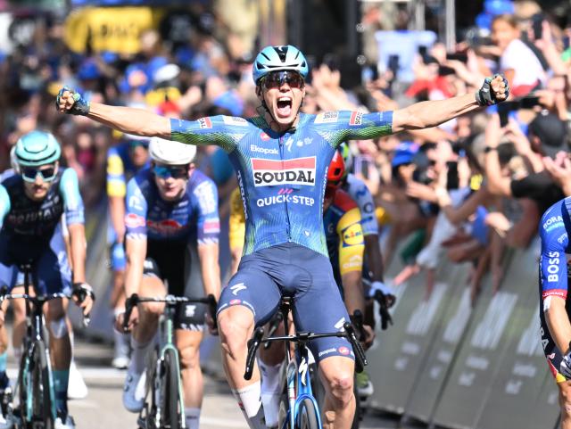 23 August 2026, Heilbronn: French rider Paul Magnier of Team Soudal Quick-Step celebrates his victory after the fourth stage of the Tour of Germany cycling race, 156.5 km from Heilbronn to Heilbronn. Photo: Uli Deck/dpa