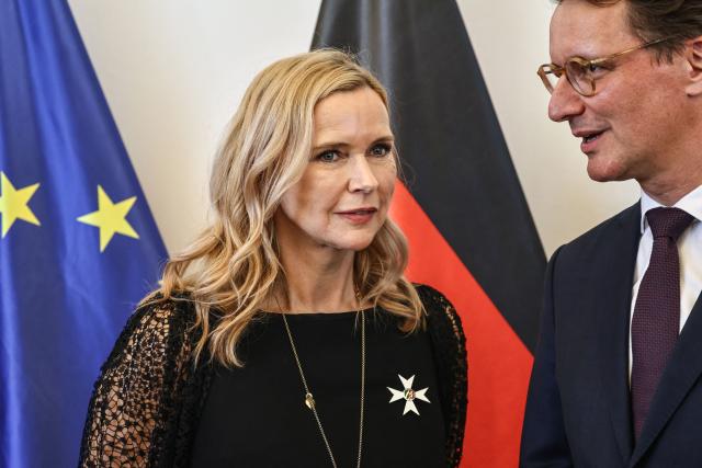 24 August 2026, North Rhine-Westphalia, Duesseldorf: German actress Veronica Ferres (L) talks with Minister President of North Rhine-Westphalia Hendrik Wuest after the award ceremony for the State Order of Merit. Photo: Oliver Berg/dpa