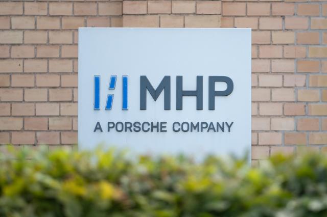 FILED - 05 August 2025, Baden-Wuerttemberg, Ludwigsburg: FILE PHOTO The MHP logo on a sign in front of the company's headquarters. Photo: Markus Lenhardt/dpa