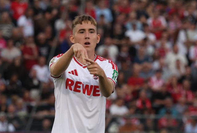 24 August 2026, Bavaria, Wuerzburg: Cologne's Isak Bergmann Johannesson celebrates scoring his side's first goal during the German DFB Cup first round soccer match between Wuerzburger Kickers and 1. FC Cologne at AKON Arena. Photo: Karl-Josef Hildenbrand/dpa - WICHTIGER HINWEIS: Gemäß den Vorgaben der Bundesliga bzw. des DFB Deutscher Fußball-Bund ist es untersagt, in dem Stadion und/oder vom Spiel angefertigte Fotoaufnahmen in Form von Sequenzbildern und/oder videoähnlichen Fotostrecken zu verwerten bzw. verwerten zu lassen.