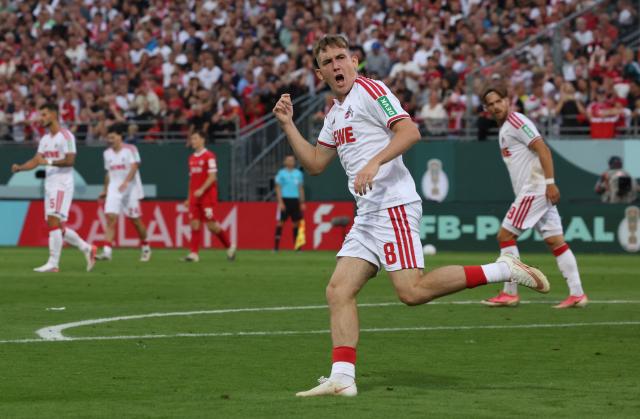 24 August 2026, Bavaria, Wuerzburg: Cologne's Isak Bergmann Johannesson celebrates scoring his side's first goal during the German DFB Cup first round soccer match between Wuerzburger Kickers and 1. FC Cologne at AKON Arena. Photo: Karl-Josef Hildenbrand/dpa - WICHTIGER HINWEIS: Gemäß den Vorgaben der Bundesliga bzw. des DFB Deutscher Fußball-Bund ist es untersagt, in dem Stadion und/oder vom Spiel angefertigte Fotoaufnahmen in Form von Sequenzbildern und/oder videoähnlichen Fotostrecken zu verwerten bzw. verwerten zu lassen.