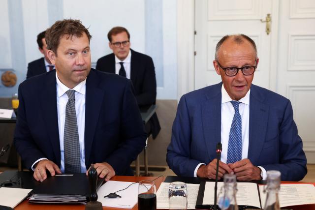 25 August 2026, Neuhardenberg: German Chancellor Friedrich Merz (R) and Vice Chancellor and Finance Minister Lars Klingbeil (SPD) are attending a two-day cabinet retreat at Neuhardenberg Castle near Berlin. Photo: Liesa Johannssen/Reuters/Pool/dpa