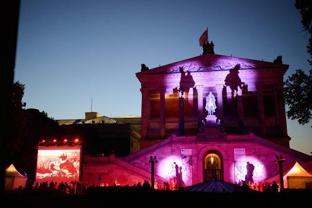 26 August 2026, Berlin: The UFA Film Nights, featuring silent film classics from early Hollywood, take place outdoors against the backdrop of Berlin's Museum Island. Photo: Annette Riedl/dpa