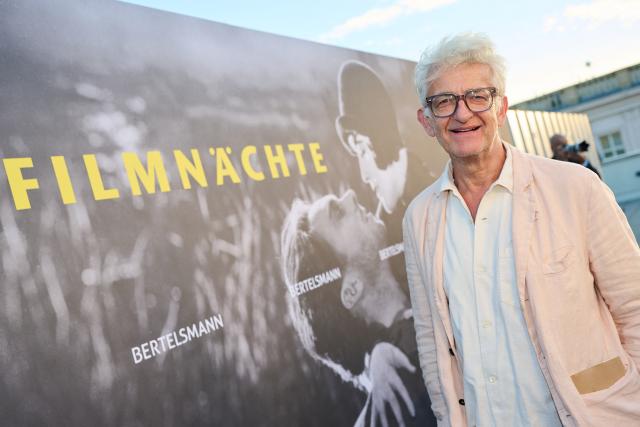 26 August 2026, Berlin: German actor Dominic Raake poses on the terrace of the Bertelsmann Foundation for the opening of the UFA Film Nights. Photo: Annette Riedl/dpa