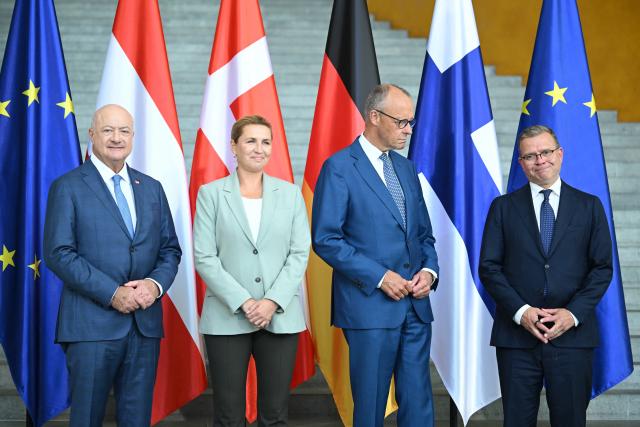 27 August 2026, Berlin: Austrian Chancellor Christian Stocker (L-R), Mette Frederiksen, Prime Minister of Denmark, German Chancellor Friedrich Merz, and Petteri Orpo, Prime Minister of Finland, pose for a group photo before the start of a small EU summit on budget planning at the Federal Chancellery. The Chancellor is gathering the heads of state and government of the countries that want to significantly reduce the budget proposal put forward by the European Commission for the years 2028 through 2034 at the Federal Chancellery in Berlin. Photo: Britta Pedersen/dpa