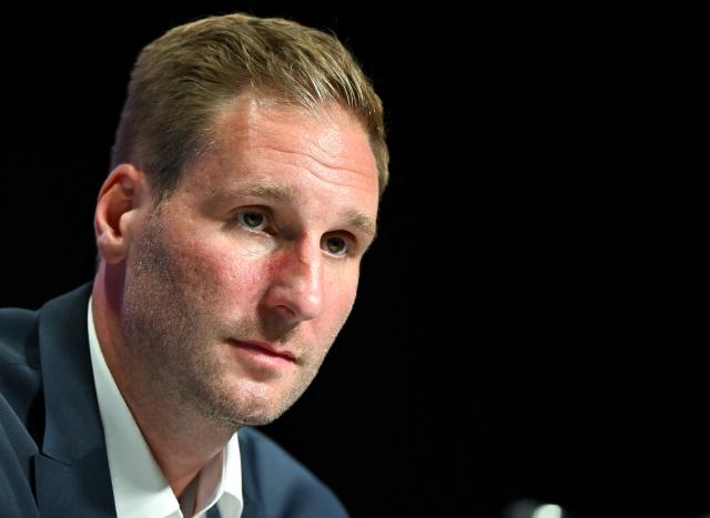 27 August 2026, Bavaria, Munich: Andre Rankel, the new head coach of the German national ice hockey team, and Christian Kuenast, sports director of the German Ice Hockey Federation, attend a press conference at the SAP Garden during Rankel's introductory presentation. Photo: A4366 Sven Hoppe/dpa