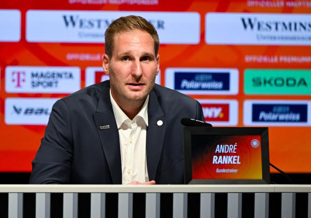 27 August 2026, Bavaria, Munich: Andre Rankel, the new head coach of the German national ice hockey team, and Christian Kuenast, sports director of the German Ice Hockey Federation, attend a press conference at the SAP Garden during Rankel's introductory presentation. Photo: A4366 Sven Hoppe/dpa