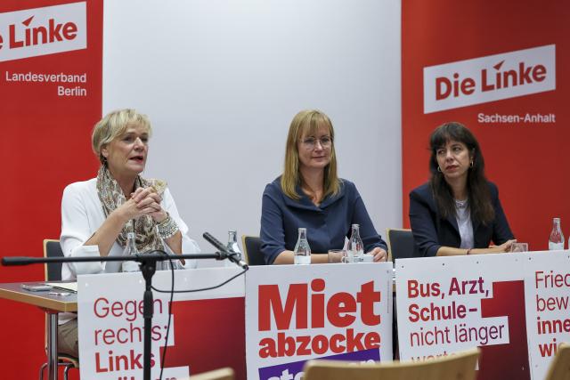 28 August 2026, Saxony-Anhalt, Halle (Saale): The leading female candidates of The Left for the upcoming state elections-Simone Oldenburg (L-R), Eva von Angern (Saxony-Anhalt), and Elif Eralp (Berlin)-have issued a joint statement. Photo: Jan Woitas/dpa