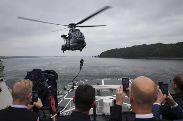 28 August 2026, Schleswig-Holstein, Flensburg: German Minister of the Interior Alexander Dobrindt (R) along with the ministers and state secretaries of the Baltic Sea littoral states, watch a demonstration by the Federal Police's GSG 9 special operations unit during a tour aboard the patrol vessel "BP 82 Bamberg" at the Muerwik Naval Academy as part of the Baltic Sea Security Summit. Photo: Christian Charisius/dpa-Pool/dpa
