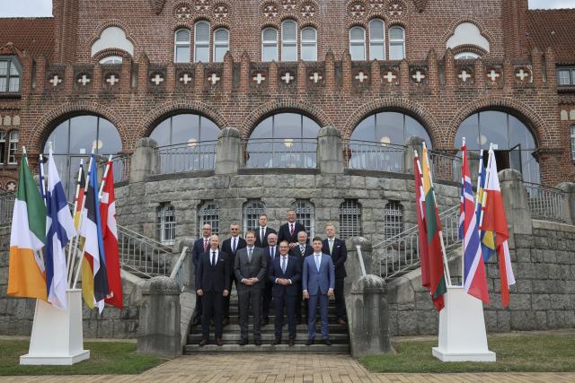 28 August 2026, Schleswig-Holstein, Flensburg: (Front, L-R) Estonian Minister of the Interior Igor Taro, Irish Minister for Justice, Home Affairs, and Migration Jim O'Callaghan, German Minister of the Interior Alexander Dobrindt, Lithuanian Minister of the Interior Martynas Katelynas and other state secretaries from the Baltic Sea states, pose for a group photo during the Baltic Sea Security Summit in front of the Muerwik Naval Academy. Photo: Christian Charisius/dpa