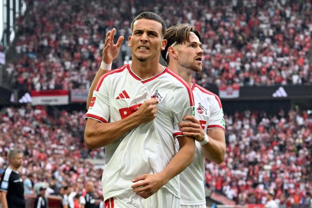 29 August 2026, North Rhine-Westphalia, Cologne: Cologne's Said El Mala (L) celebrates scoring his side's first goal with teammate Jan Thielmann during the German Bundesliga soccer match between 1. FC Cologne and TSG 1899 Hoffenheim at RheinEnergieStadion. Photo: Federico Gambarini/dpa - WICHTIGER HINWEIS: Gemäß den Vorgaben der Bundesliga bzw. des DFB Deutscher Fußball-Bund ist es untersagt, in dem Stadion und/oder vom Spiel angefertigte Fotoaufnahmen in Form von Sequenzbildern und/oder videoähnlichen Fotostrecken zu verwerten bzw. verwerten zu lassen.