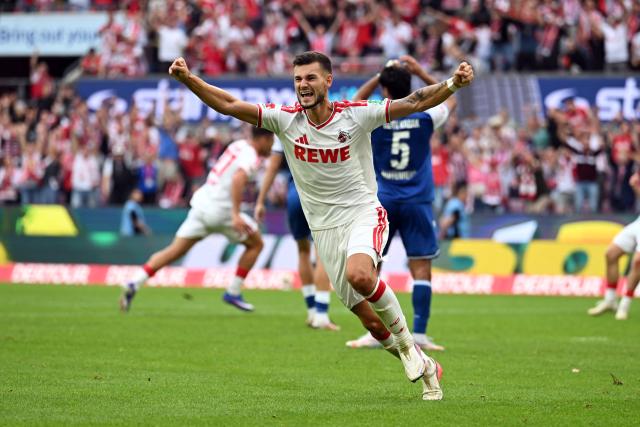 29 August 2026, North Rhine-Westphalia, Cologne: Cologne's Tom Krauss celebrates his side's third goal during the German Bundesliga soccer match between 1. FC Cologne and TSG 1899 Hoffenheim at RheinEnergieStadion. Photo: Federico Gambarini/dpa - WICHTIGER HINWEIS: Gemäß den Vorgaben der Bundesliga bzw. des DFB Deutscher Fußball-Bund ist es untersagt, in dem Stadion und/oder vom Spiel angefertigte Fotoaufnahmen in Form von Sequenzbildern und/oder videoähnlichen Fotostrecken zu verwerten bzw. verwerten zu lassen.