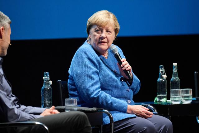 29 August 2026, Berlin: Former German Chancellor Angela Merkel (R) speaks with Meron Mendel, an Israeli-German educator, journalist, professor, and director of the Anne Frank Educational Center, at the Haus der Berliner Festspiele. The discussion is part of the "Reflexe & Reflexionen" theme days organized by the Berliner Festspiele. Photo: Annette Riedl/dpa