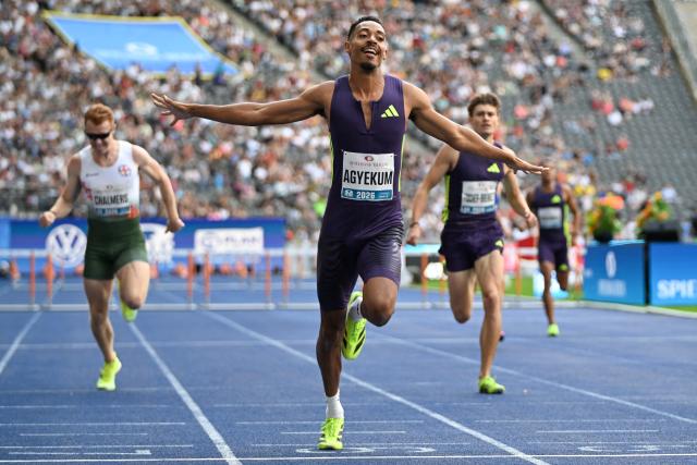 30 August 2026, Berlin: Germany's Emil Agyekum (C) celebrates as he crosses the finish line of the Men's 400-meter hurdles race during the International Stadium Festival (ISTAF) Berlin athletic meeting at the Olympic Stadium. Photo: Elisa Schu/dpa