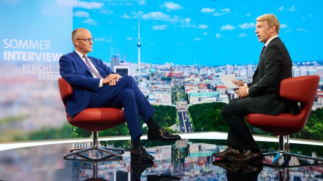 30 August 2026, Berlin: German Chancellor Friedrich Merz (L) is interviewed in the studio during the ARD (German public broadcaster) summer interview "Bericht aus Berlin" (Report from Berlin) with host Markus Preiss. Photo: Annette Riedl/dpa