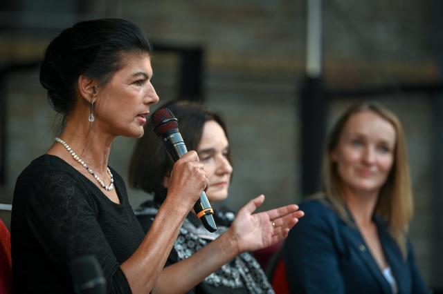30 August 2026, Saxony-Anhalt, Magdeburg: (L-R) Alliance Sahra Wagenknecht (BSW) founder and Commission on Core Values chair Sahra Wagenknecht, author Daniela Dahn, and BSW's lead candidate for Saxony-Anhalt Claudia Wittig are seated on stage during the panel discussion "All Quiet on the Eastern Front: Dictatorship of Opinion 2.0?" at Mark Fortress. The BSW is hosting a "Festival of Free Speech - Together Against Cancel Culture" at Mark Fortress. Photo: Heiko Rebsch/dpa