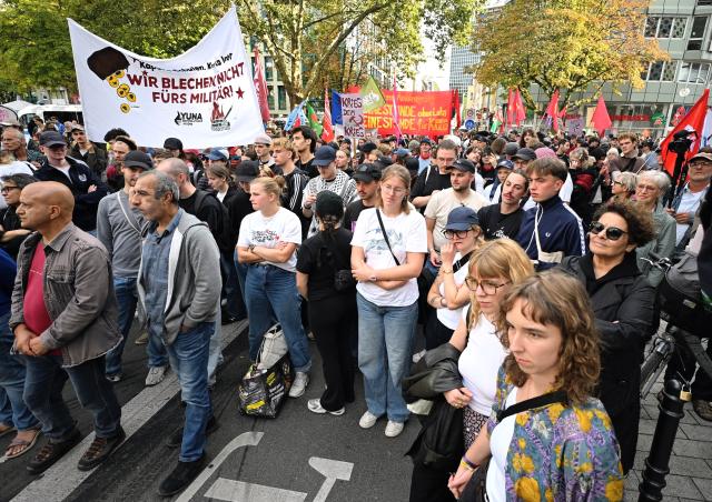 01 September 2026, North Rhine-Westphalia, Cologne: Several hundred people are demonstrating against rearmament at the start of the "Disarm Rheinmetall" protest camp. Last year, violent clashes broke out during a demonstration held as part of the event. Photo: Henning Kaiser/dpa