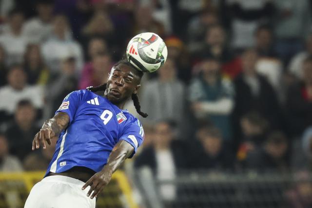 FILED - 23 March 2025, North Rhine-Westphalia, Dortmund: FILE PHOTO - Italy's Moise Kean in action during the UEFA Nations League A play-off quarterfinal second leg soccer match between Germany and Italy, at Signal Iduna Park. Como announced the signing of Italian international striker Moise Kean from Fiorentina on loan, with a mandatory clause to purchase the contract permanently. Photo: Christian Charisius/dpa