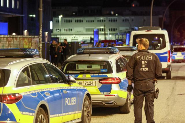 01 September 2026, Hamburg: Police officers are stationed on Lagerstrase near the exhibition halls, where a spokesperson for the command center reported that a major police operation is underway. Photo: Bodo Marks/dpa