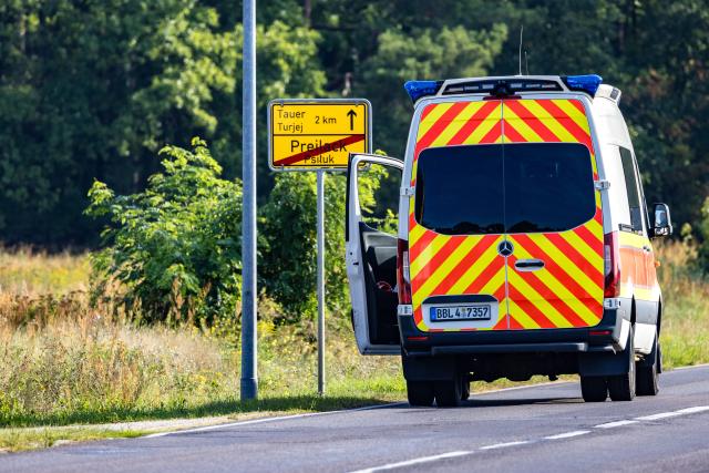 02 September 2026, Brandenburg, Turnow-Preilack: A police ambulance is parked near the substation. Following the act of sabotage against the power grid in southern Brandenburg, police are continuing to search the scene for clues to help identify the perpetrators. Photo: Frank Hammerschmidt/dpa