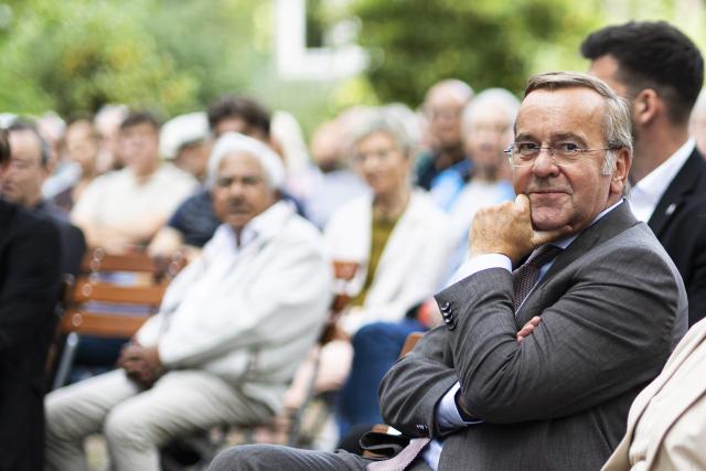 02 September 2026, Lower Saxony, Brunswick: Boris Pistorius, German Minister of Defense, is sitting in a beer garden during a public discussion event. Photo: Michael Matthey/dpa