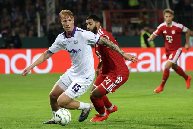 02 September 2026, Lower Saxony, Osnabrueck: Osnabrueck's Bjarke Jacobsen and Bayern Munich's Ismael Saibari battle for the ball during the German Cup (DFB Pokal) first round soccer match between VfL Osnabrueck and FC Bayern Munich at the Stadion an der Bremer Bruecke. Photo: David Ebener/dpa - IMPORTANT NOTICE: Bundesliga and DFB regulations prohibit any use of photographs as image sequences and/or quasi-video.