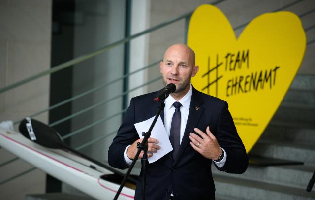 03 September 2026, Berlin: Two-time Olympic canoeing champion Ronald Rauhe speaks  at the Federal Chancellery. Rauhe, 44, has been appointed by Chancellor Friedrich Merz as the new Minister of State for Sports and Volunteer Work, succeeding Christiane Schenderlein, who left the position to join the Federal Ministry of Health as a Parliamentary State Secretary. Photo: Bernd von Jutrczenka/dpa