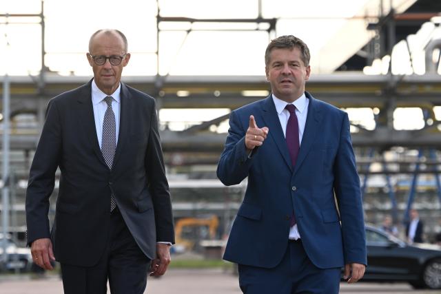 03 September 2026, Saxony-Anhalt, Leuna: German Chancellor Friedrich Merz and Sven Schulze (R), Minister-President of Saxony-Anhalt, visit the UPM Biochemicals GmbH biorefinery in Leuna. The Chancellor and the Minister President are visiting the facility operated by the Finnish corporation UPM just a few days before the state election in Saxony-Anhalt. Once fully operational, the plant is expected to convert sustainably produced, certified forest biomass into up to 220,000 metric tons of biochemicals annually. Photo: Hendrik Schmidt/dpa