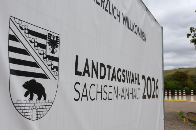 04 September 2026, Saxony-Anhalt, Magdeburg: The logo of the Saxony-Anhalt State Parliament is displayed in front of the exhibition halls ahead of the 2026 Saxony-Anhalt legislative election. Photo: Peter Gercke/dpa