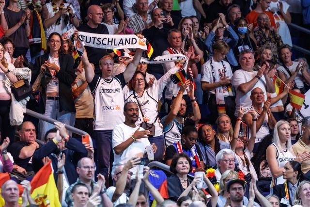 04 September 2026, Berlin: Germany fans cheer on their team during the FIBA Women's Basketball World Cup preliminary round Group A match against Spain. Photo: Andreas Gora/dpa