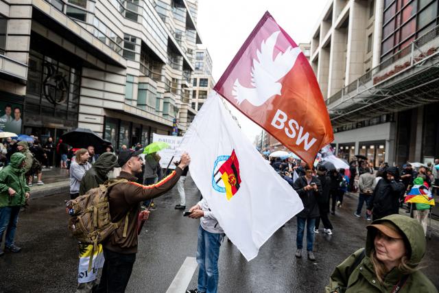 04 September 2026, Berlin: People take part in a BSW demonstration in front of the Russian House under the slogan "Bridges Instead of Walls: In Support of the Russian House and the Goethe-Institutes in Russia". Photo: Fabian Sommer/dpa
